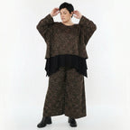 Marlenehose aus warmem Jacquard in Schwarz Cognac Orange mit weitem Bein und Taschen