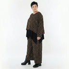Marlenehose aus warmem Jacquard in Schwarz Cognac Orange mit weitem Bein und Taschen