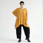 Senffarbenes A-LinienShirt aus weichem Stretchjersey mit Rundhals Langarm Saumschlitzen
