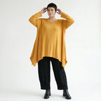 Senffarbenes A-LinienShirt aus weichem Stretchjersey mit Rundhals Langarm Saumschlitzen