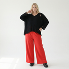 Rote Milano Stretch Hose mit weitem geradem Bein in Siebenachtellänge und Saumschlitz edel