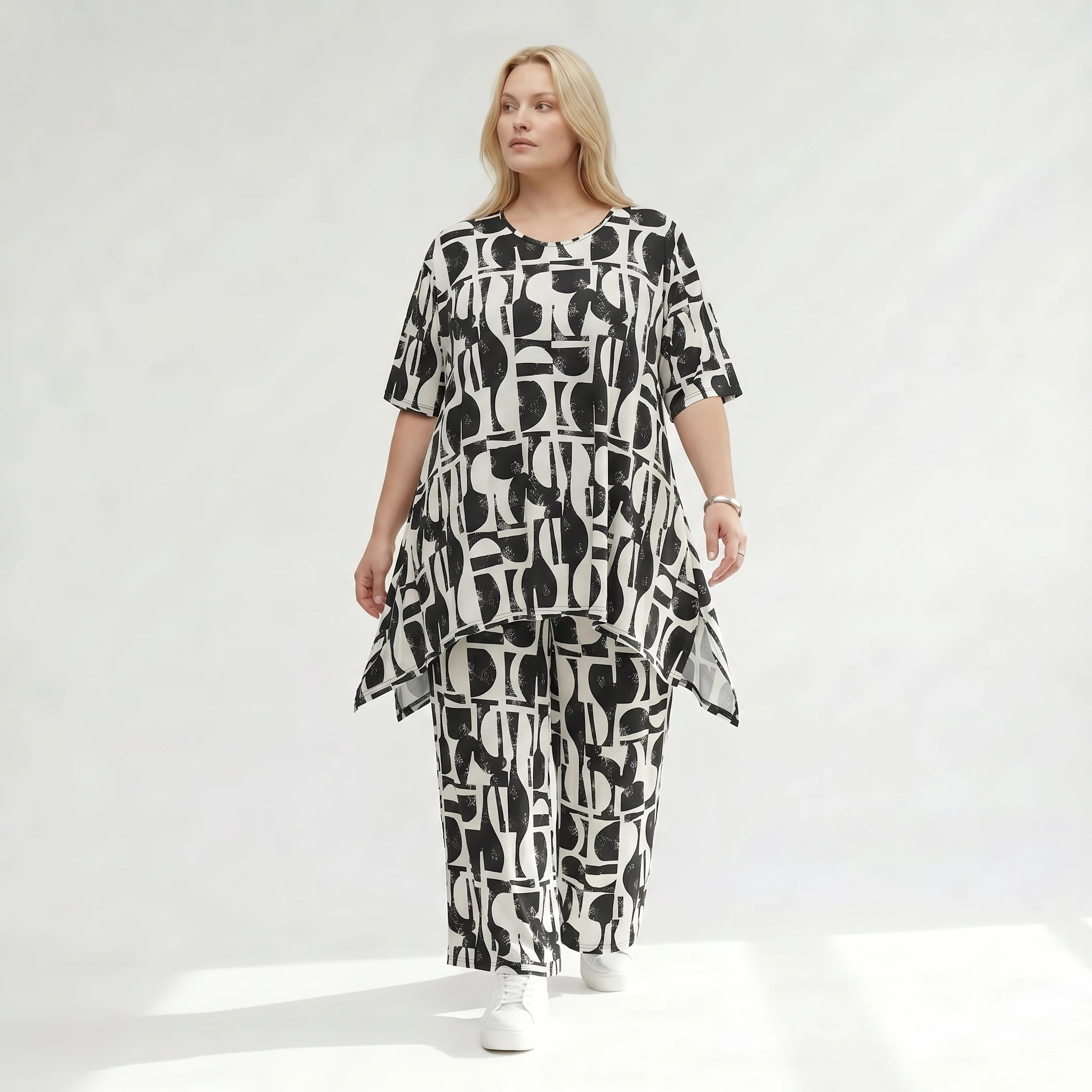 Zeitlose Palazzo Hose im ausgefallenen Lagenlook mit weich fließendem Stretch und abstraktem Muster, Schwarz/Weiß