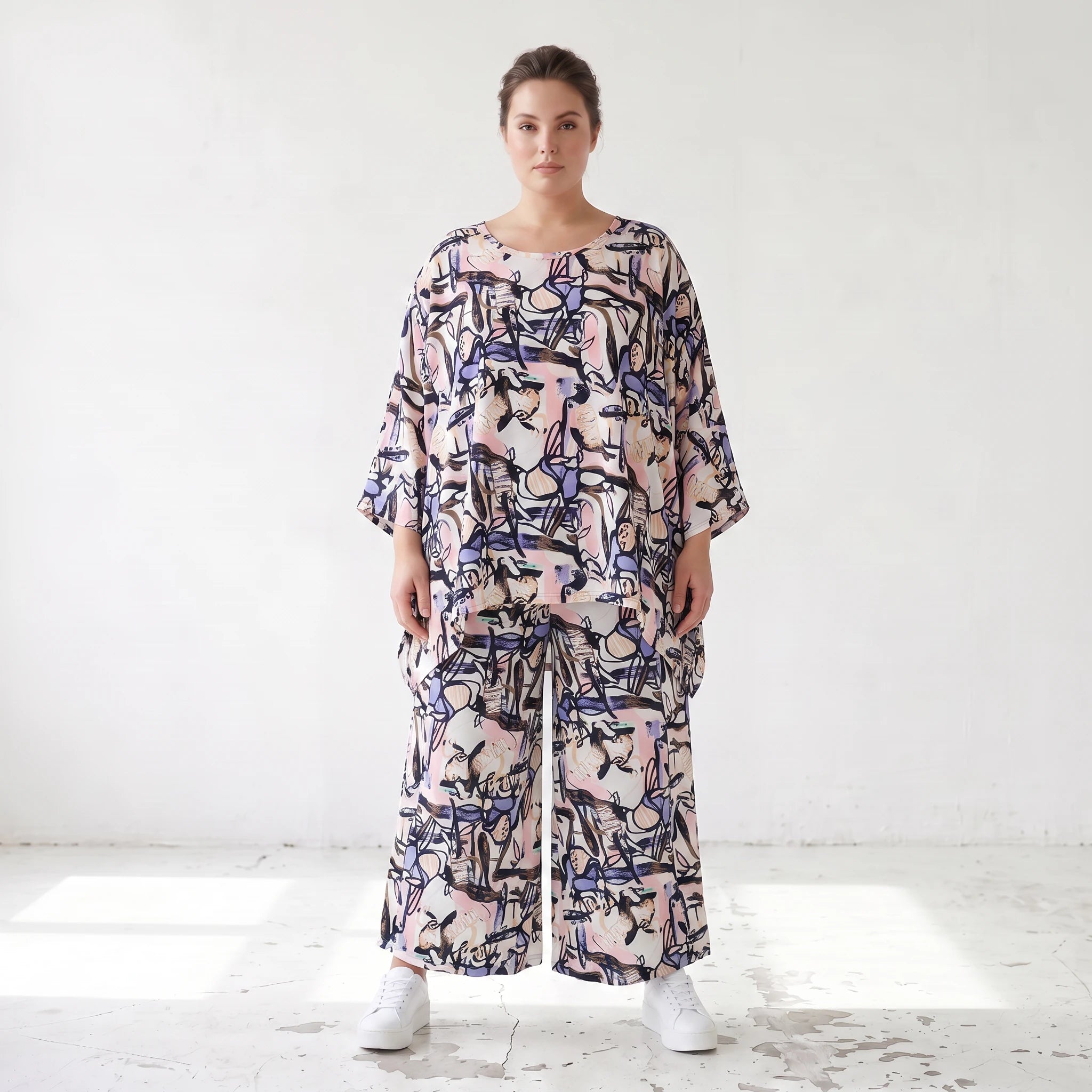 Oversized Shirt aus leichter Viskose Popeline in zartem Rosa mit asymmetrischem Schnitt