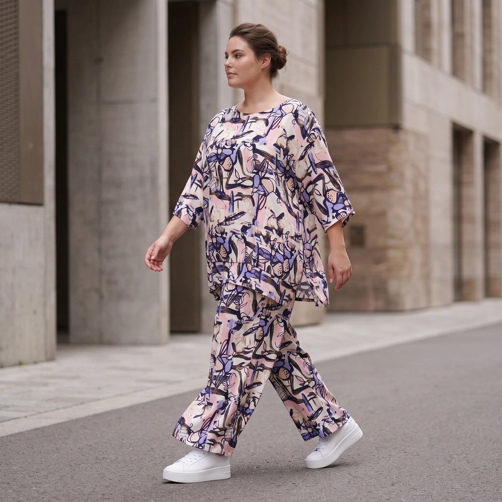 Elegante fließende Palazzo Hose aus reiner Viskose in zartem Rosa mit Bund und Taschen
