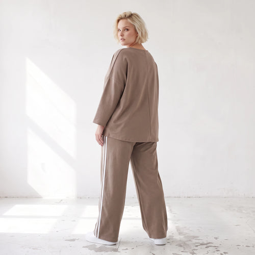 Sweatshirt aus French Terry mit Smileyprint und asymmetrischer Tasche in gerundeter Form