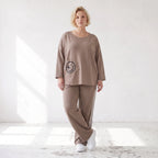 Sweatshirt aus French Terry mit Smileyprint und asymmetrischer Tasche in gerundeter Form