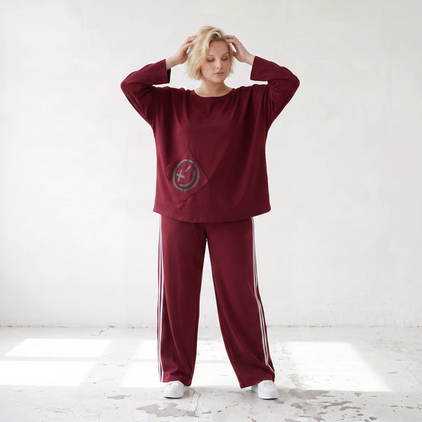Rote Ballonhose aus French Terry mit Kontraststreifen und elastischem Bund Streetwear