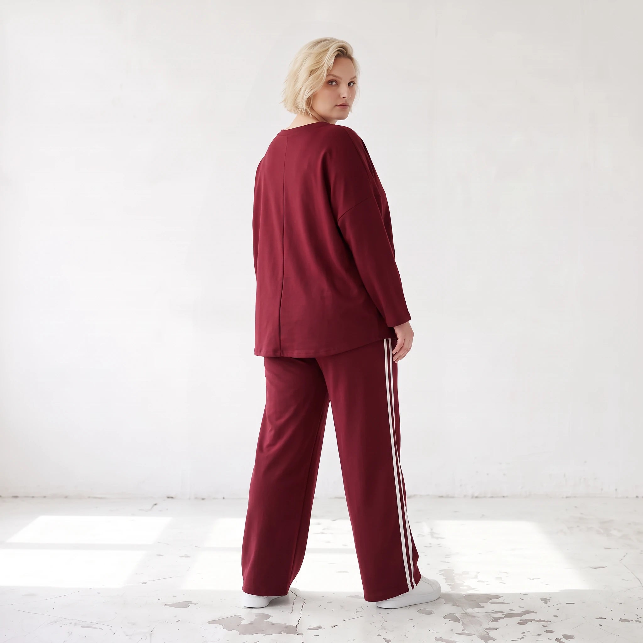 Rote Ballonhose aus French Terry mit Kontraststreifen und elastischem Bund Streetwear