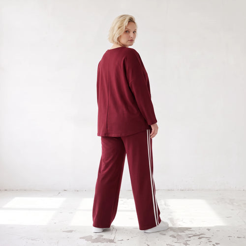 Rote Ballonhose aus French Terry mit Kontraststreifen und elastischem Bund Streetwear