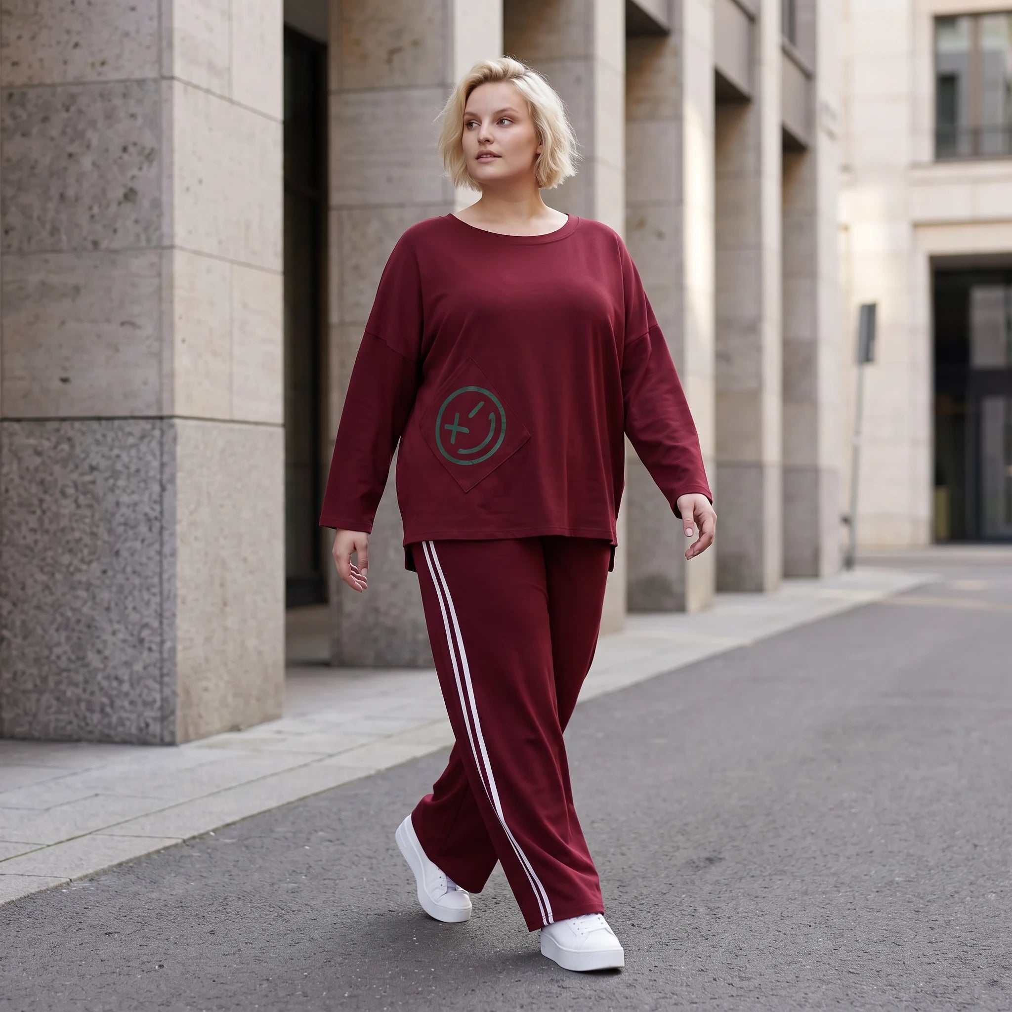 Rote Ballonhose aus French Terry mit Kontraststreifen und elastischem Bund Streetwear