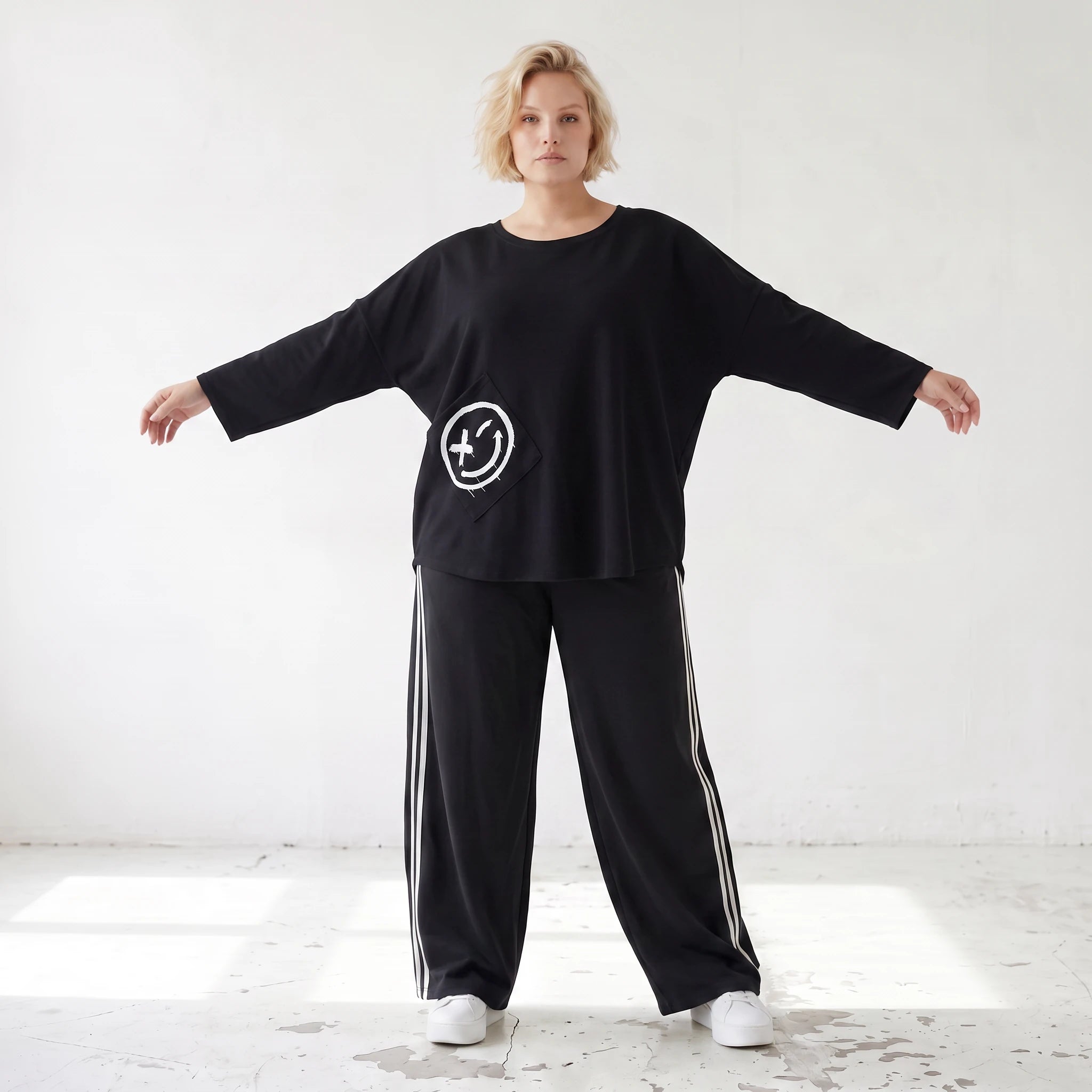 Ballonhose mit elastischem Bund und weissen Kontraststreifen im sportlichen College Look