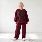 Kastiges Langarmshirt aus French Terry mit Statement Print und sichtbaren Außennähten