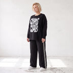 Statementshirt aus French Terry mit Chaos Club Print kastig und vorne kürzer geschnitten
