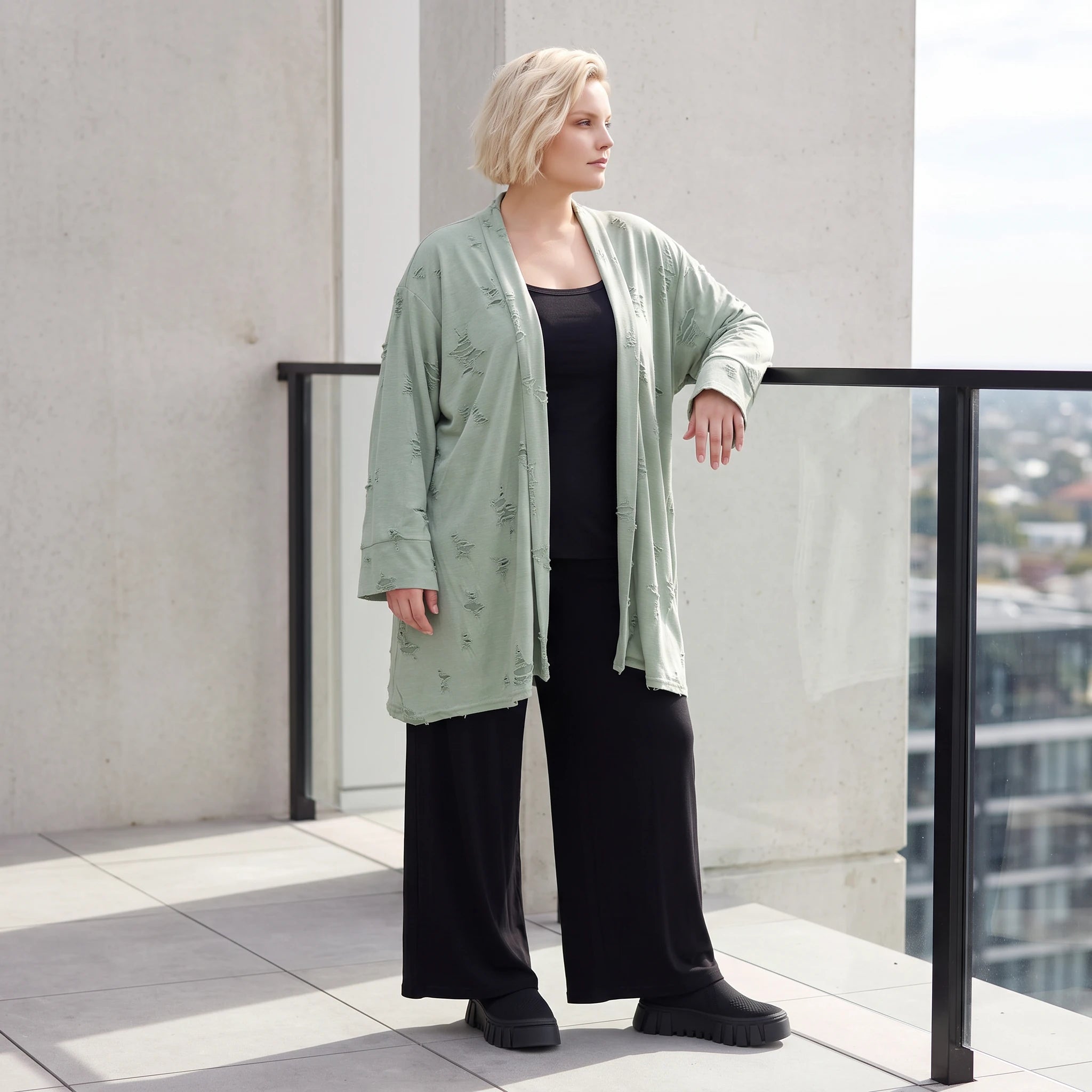 Pistaziengrüner Jerseycardigan in A-Linie mit Sternenmotiv aus Baumwolle und Elasthan