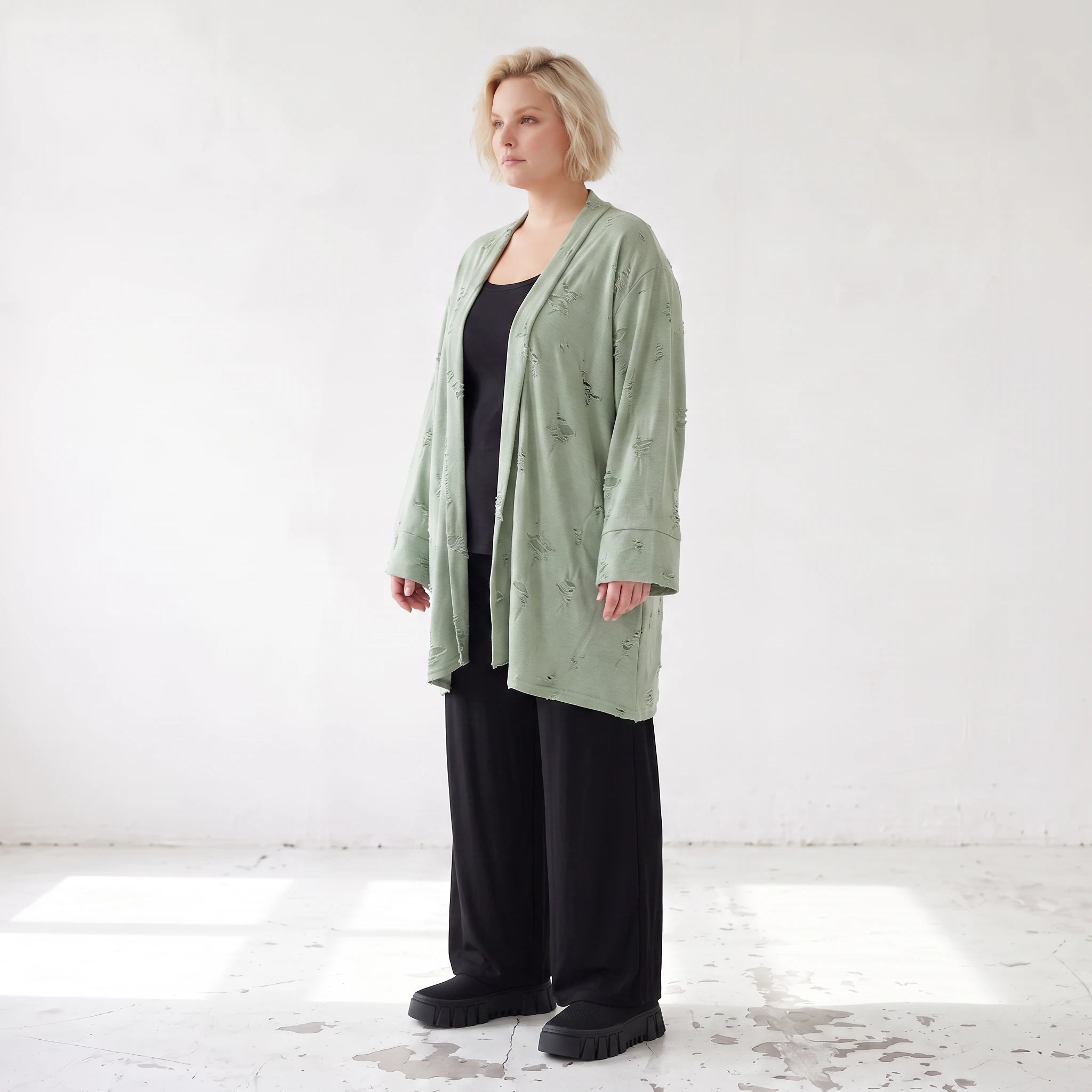Pistaziengrüner Jerseycardigan in A-Linie mit Sternenmotiv aus Baumwolle und Elasthan
