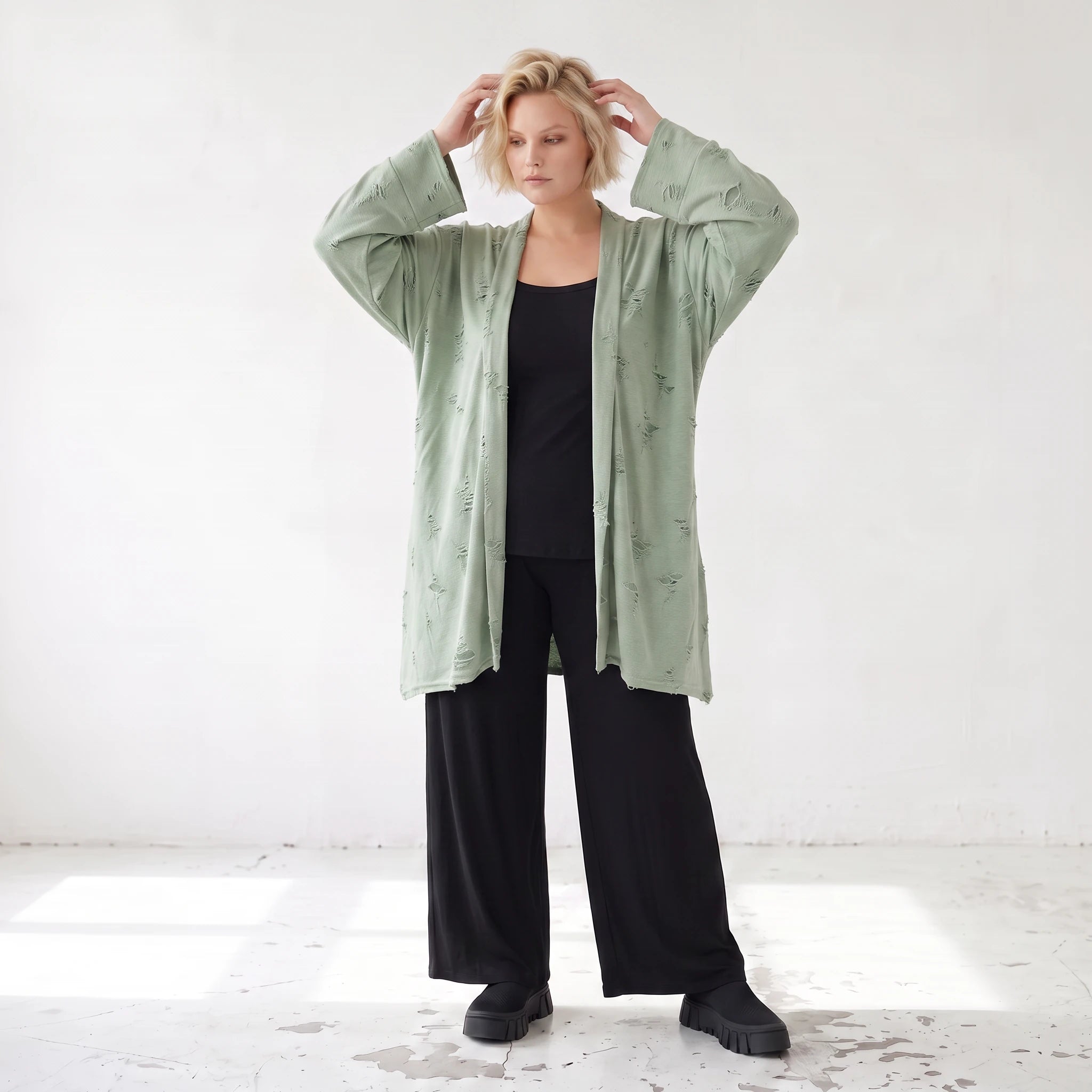 Pistaziengrüner Jerseycardigan in A-Linie mit Sternenmotiv aus Baumwolle und Elasthan