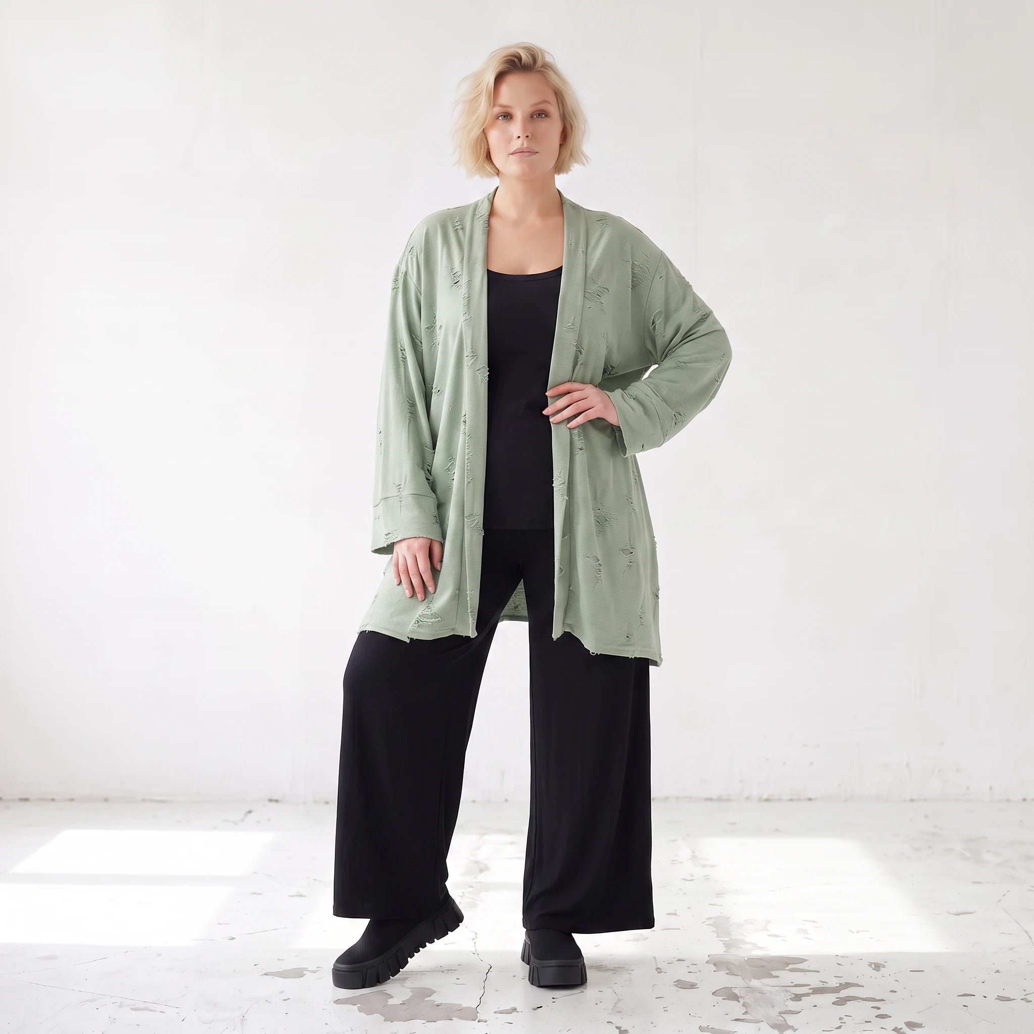 Pistaziengrüner Jerseycardigan in A-Linie mit Sternenmotiv aus Baumwolle und Elasthan