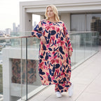 Ballonkleid aus Satin mit floralem Print in Rose/Blau/Pink Rundhals Langarm weit weich