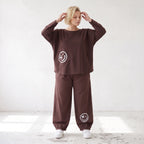 Lässige Oversizedhose aus French Terry mit Smileyprint und gesmoktem Saum extra lang
