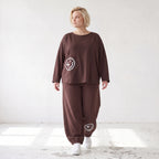 Lässige Oversizedhose aus French Terry mit Smileyprint und gesmoktem Saum extra lang