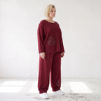 Oversized French Terry Hose in Schwarz mit Smileyprint gesmoktem Saum und weitem Bein