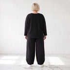 Oversized Hose aus flauschigem French Terry mit Smileydruck und bequem gesmoktem Saum