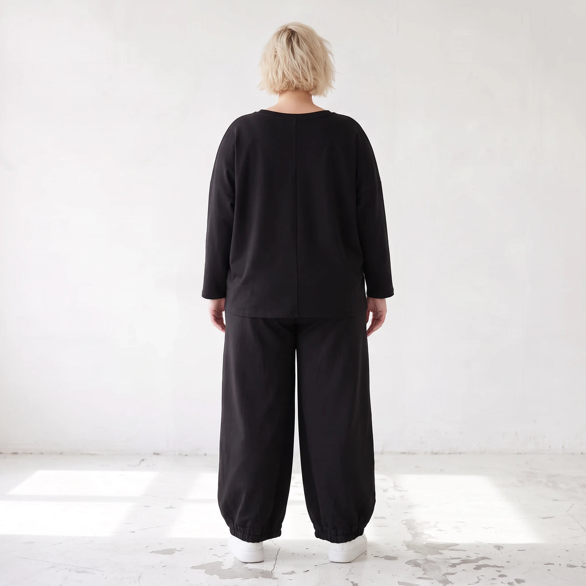 Oversized Hose aus flauschigem French Terry mit Smileydruck und bequem gesmoktem Saum