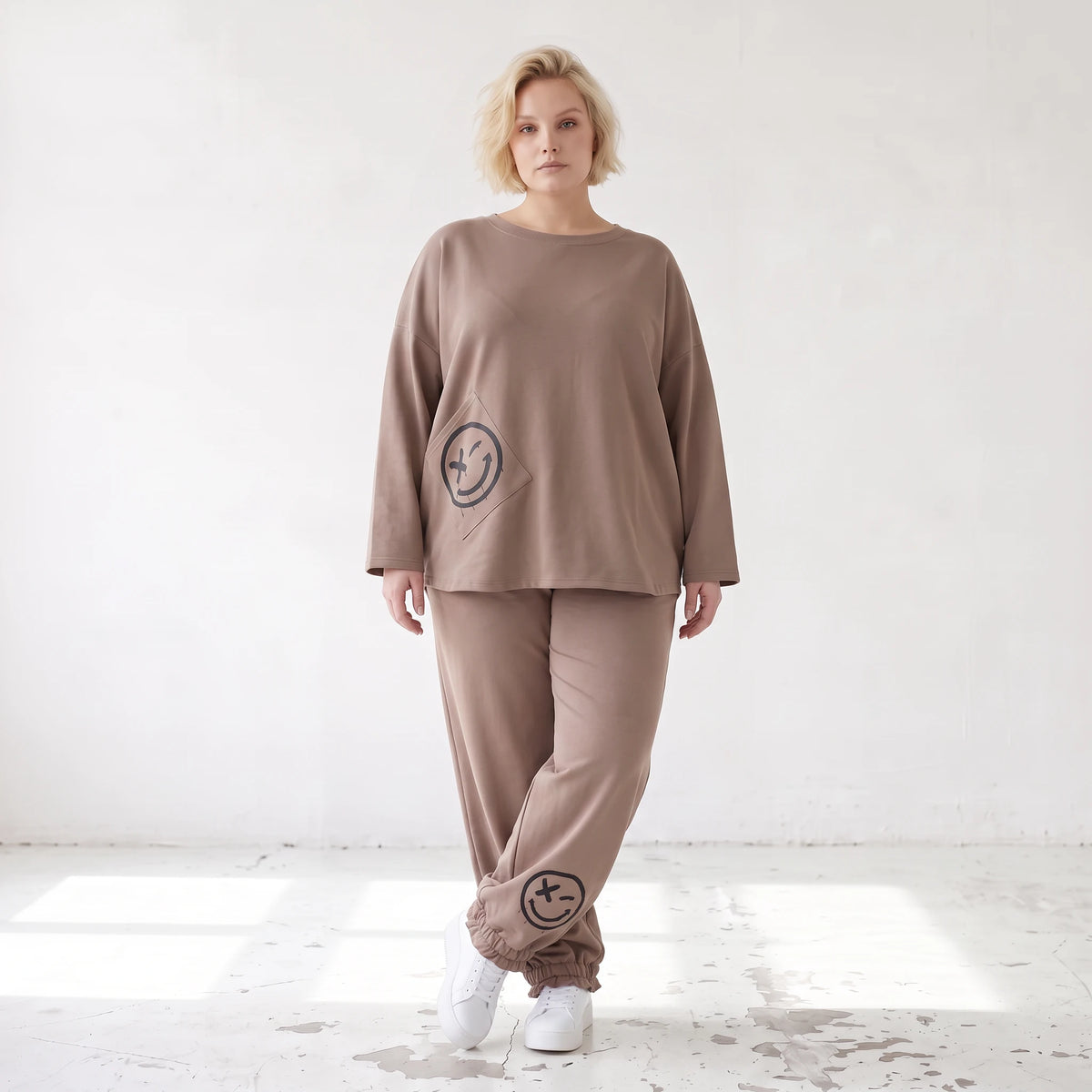 French-Terry Oversizedhose mit Smiley-Print gesmoktem Saum und Seitentaschen Streetstyle