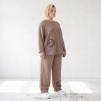 French-Terry Oversizedhose mit Smiley-Print gesmoktem Saum und Seitentaschen Streetstyle