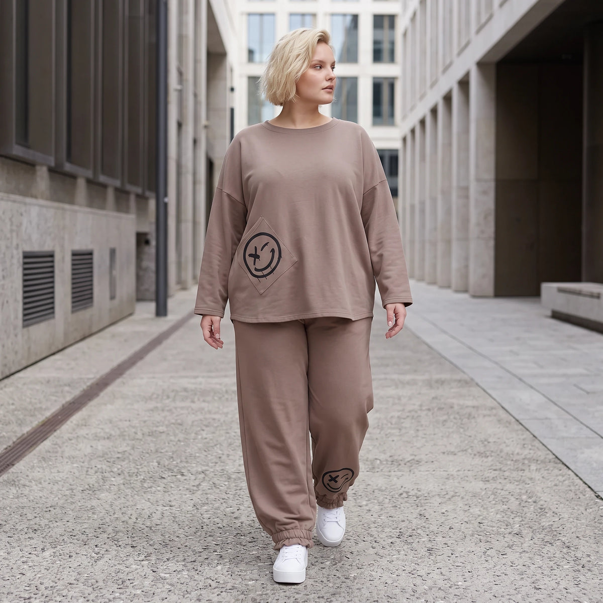French-Terry Oversizedhose mit Smiley-Print gesmoktem Saum und Seitentaschen Streetstyle