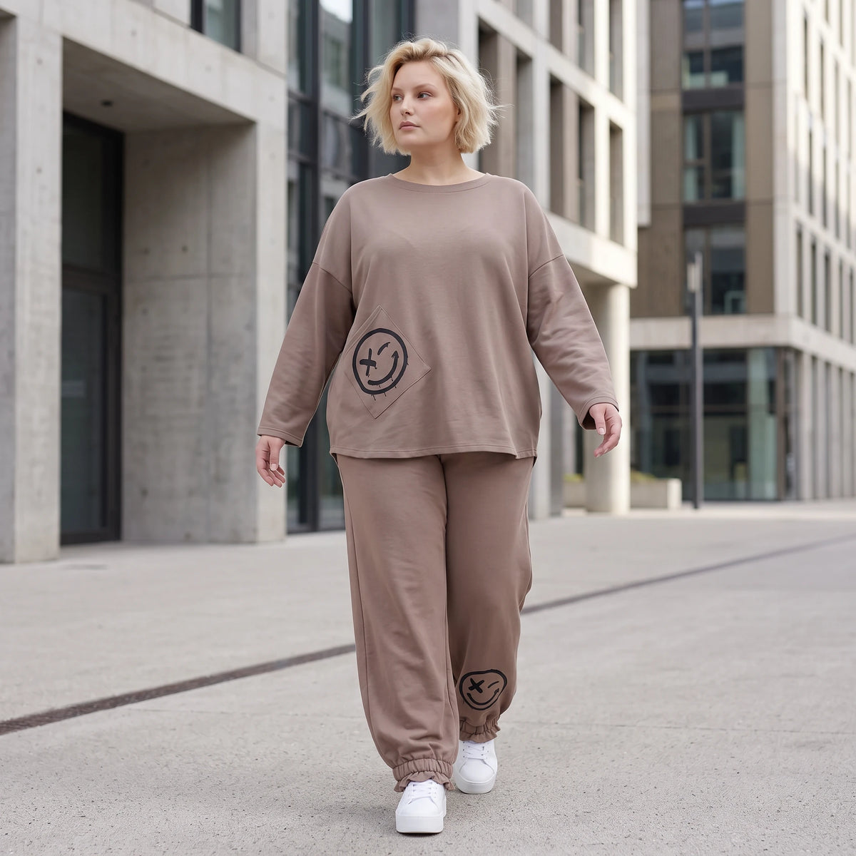French-Terry Oversizedhose mit Smiley-Print gesmoktem Saum und Seitentaschen Streetstyle