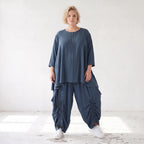 Shirt in Petrol aus weichem Lyocell in A-Linie mit Biesenmusterung und Zipfelsaum