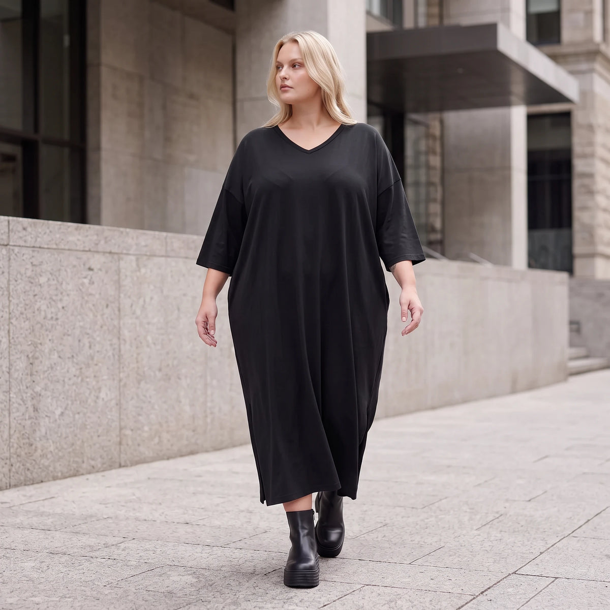 Fließendes A-Linien-Kleid aus Lyocell mit V-Ausschnitt Seitennahttaschen Saumschlitzen