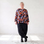Langarmshirt aus Romanit Jersey in Schwarz/Orange mit Glockenschnitt pflegeleicht weich