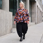 Langarmshirt aus Romanit Jersey in Schwarz/Orange mit Glockenschnitt pflegeleicht weich