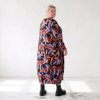 Weiches Romanitjerseykleid in Schwarz/Orange mit Ballonform Langarm Rundhalsausschnitt