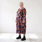 Weiches Romanitjerseykleid in Schwarz/Orange mit Ballonform Langarm Rundhalsausschnitt