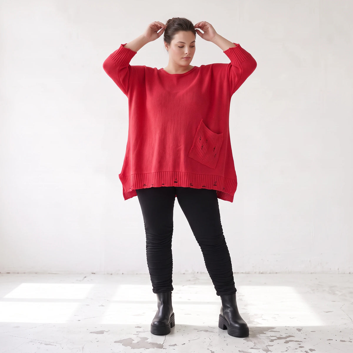Warmes rotes Strickshirt in A-Linie aus weicher dehnbarer Stretchware mit Destroyedoptik