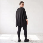 Warmes schwarzes Strickshirt in A-Linie mit Stretch und Destroyedoptik für Winterlooks