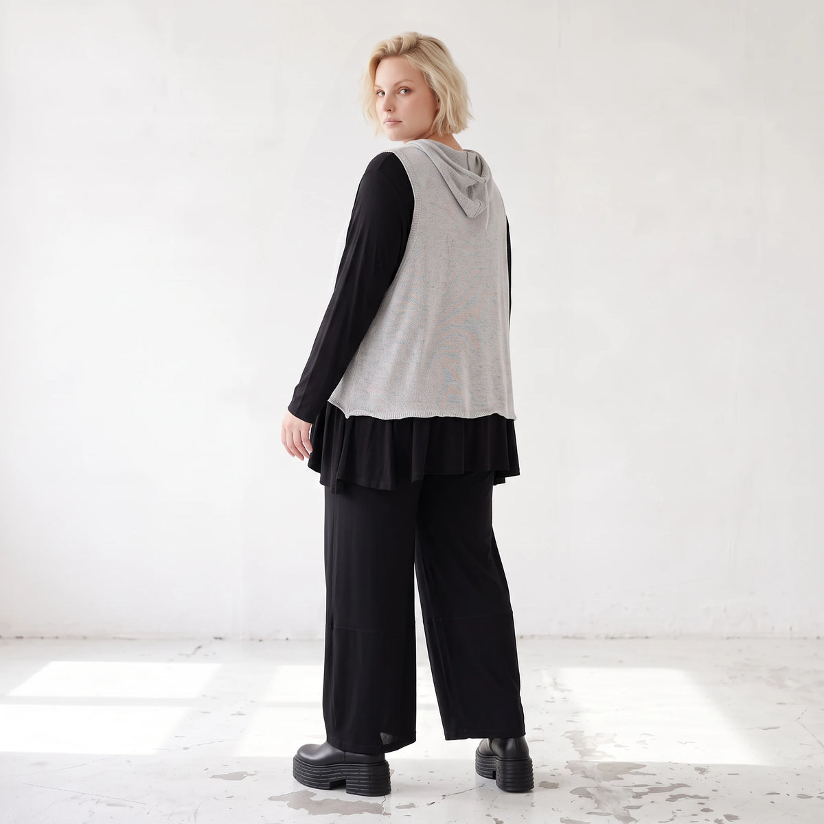 Ärmelloser Stricküberwurf in A-Linie mit Kapuze Tunnelzug Tasche und Baumwollstretch