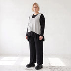Ärmelloser Stricküberwurf in A-Linie mit Kapuze Tunnelzug Tasche und Baumwollstretch