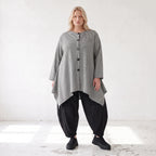 Bengalinebluse in Schwarz/Weiß A-Linie mit Rundhalsausschnitt Taschen und Zipfelsaum