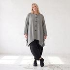 Bengalinebluse in Schwarz/Weiß A-Linie mit Rundhalsausschnitt Taschen und Zipfelsaum