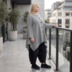 Bengalinebluse in Schwarz/Weiß A-Linie mit Rundhalsausschnitt Taschen und Zipfelsaum