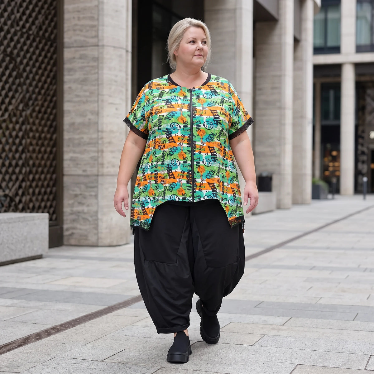 Vokuhilaweste aus softem Stretchjersey mit Netzdetail und lockerem Schnitt modern chic