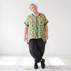 Vokuhilaweste aus softem Stretchjersey mit Netzdetail und lockerem Schnitt modern chic
