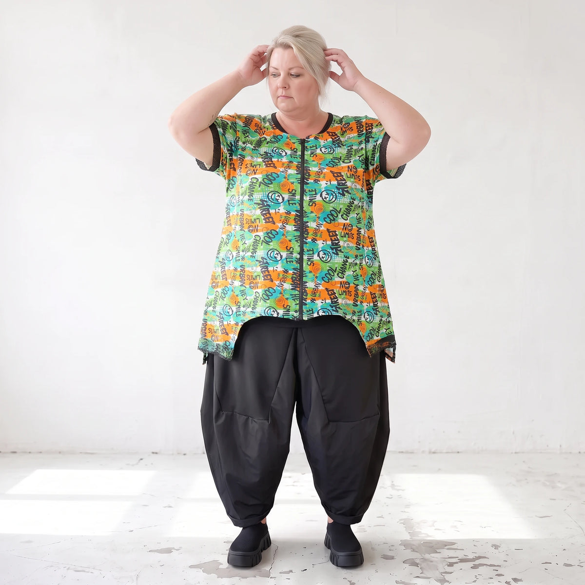 Vokuhilaweste aus softem Stretchjersey mit Netzdetail und lockerem Schnitt modern chic