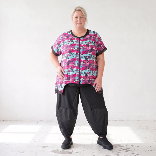 Asymmetrische Vokuhilaweste aus Jersey und Netzstoff im Materialmix vorne kurz hinten lang