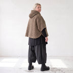 Kuschelige Teddyweste in Beige mit Tüllkombination ärmellos warm für schicke Winterlooks