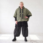 Teddyweste mit Kapuze und Tuelldetails in gerundeter Form weich warm fuer Wintertage